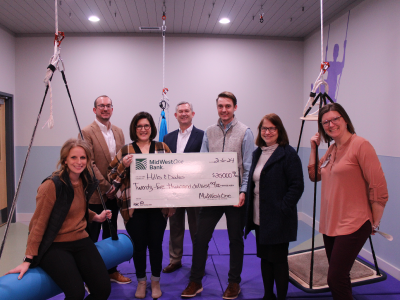 MidWestOne Bank presents check for $25,000 to Hills and Dales