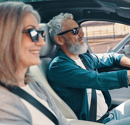 middle age couple in vehicle