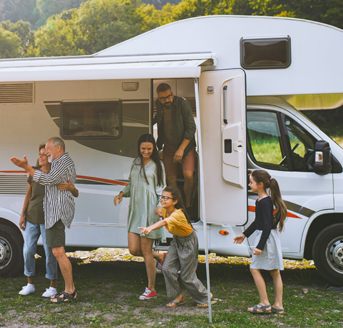 family outside of recreational vehicle