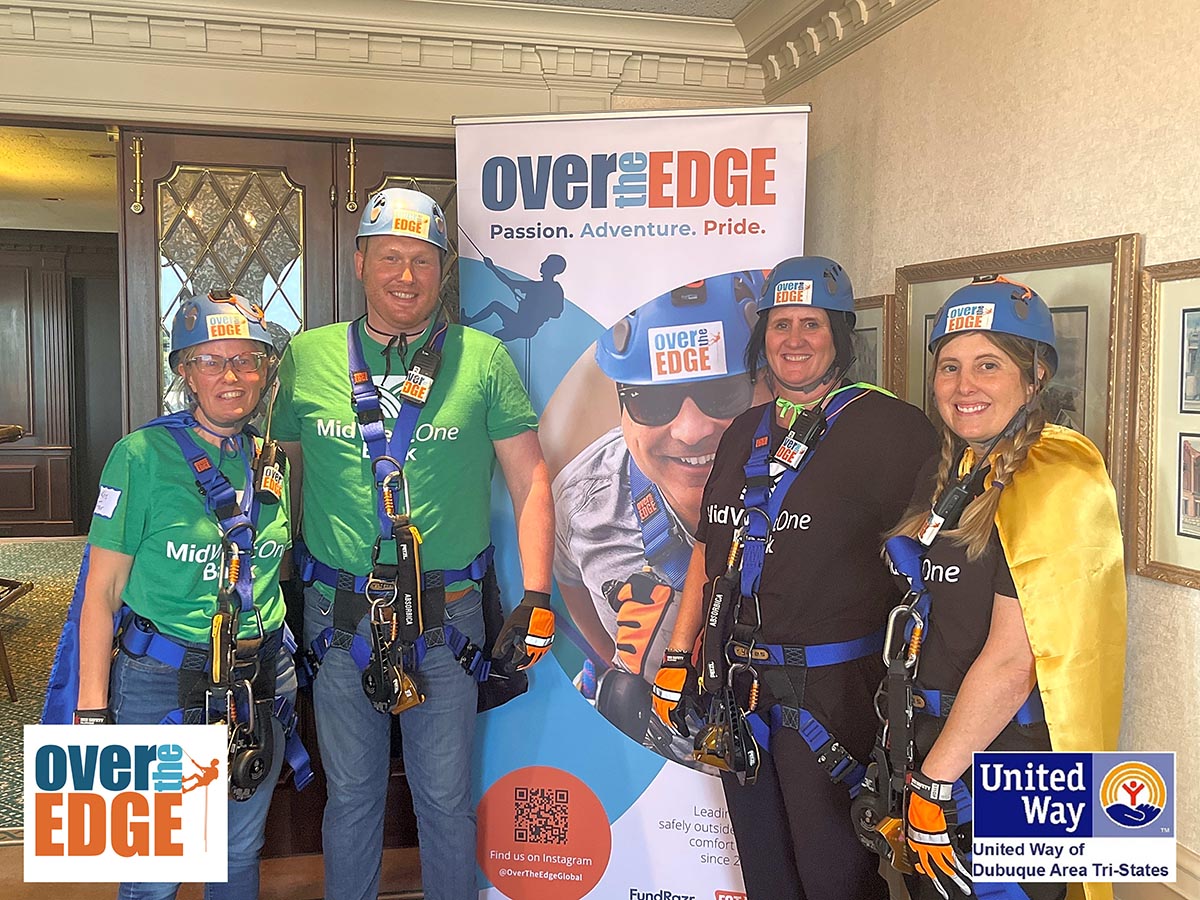 MidWestOne Employees in rappelling gear getting ready for the United Way Over The Edge Fundraiser